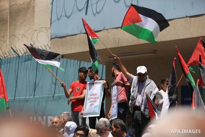 Palestinians take part in a protest demanding their rights in front of the headquarters United Nations Relief and Works Agency (UNRWA), in Gaza City on June 20, 2023. Each year on 20 June, the world celebrates World Refu...