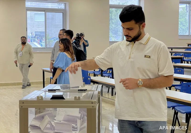 Palestinian students cast their votes in the student council elections at Birzeit University on the outskirts of Ramallah in the West Bank, on May 24, 2022. Photo by Ahmad Arouri \ apaimages