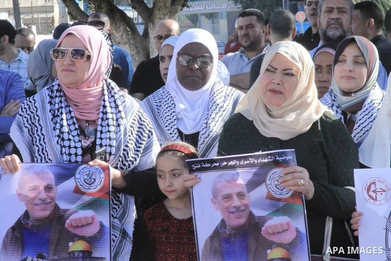 Palestinians take part in a protest to the support with the sick prisoner, Walid Daqqa, helds Israeli Jails, in Gaza city on May 25, 2023. Daqqa, 61, who suffers from an advanced stage of bone marrow cancer. He was impri...