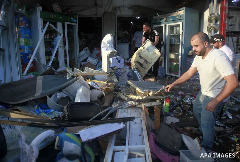 Palestinians inspect the damage during an Israeli army raid in the refugee camp of Nur Shams, east of the West Bank city of Tulkarm on May 30, 2023. Israeli forces raided the camp and broke into the family house of the s...