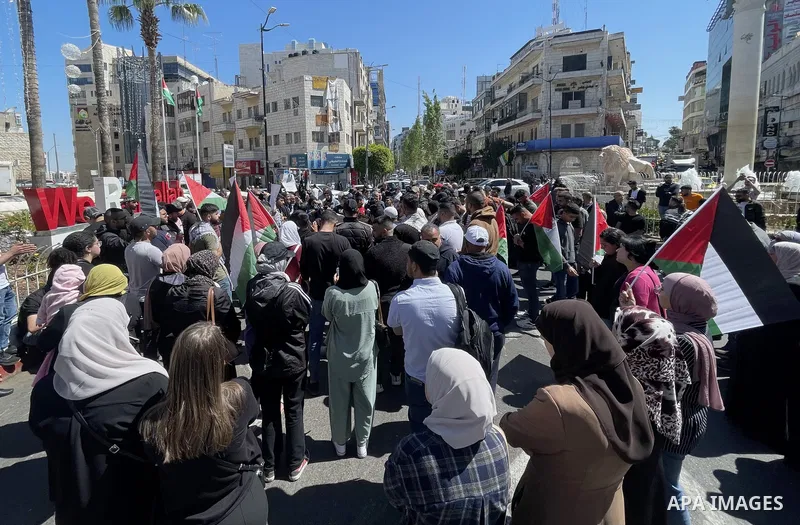 Palestinians take part in a protest following the announcement of the death of a Palestinian hunger striker Khader Adnan who was in Israeli Jails in the West Bank city of Ramallah on May 2, 2023. Israel's prison service...