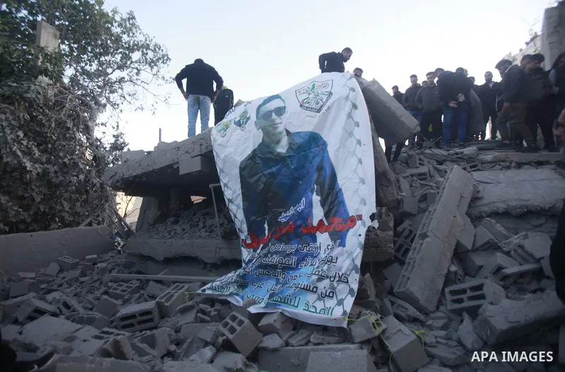 People gather amidst debris after Israeli forces demolished the home of a Palestinian accused of killing an Israeli soldier, in the village of Hares, in the West Bank, on May 3, 2023. The Israeli forces, accompanied by 5...