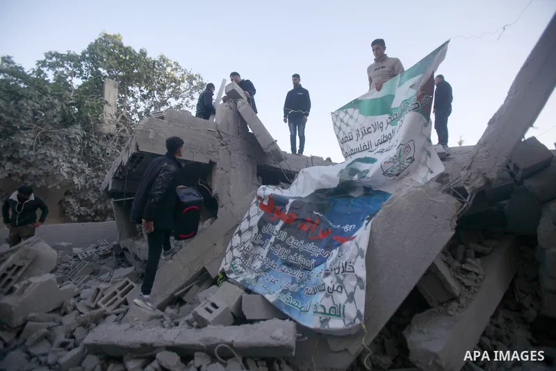 People gather amidst debris after Israeli forces demolished the home of a Palestinian accused of killing an Israeli soldier, in the village of Hares, in the West Bank, on May 3, 2023. The Israeli forces, accompanied by 5...