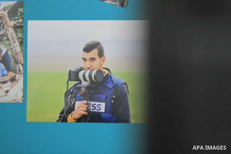 A Palestinian journalist photographer Moutasem brother of Journalist Yasser Murtaja's who was shot killed by Israeli forces during protests at the Gaza-Israel border on 2018, works at his office during World Press Freedo...