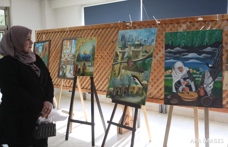 Palestinians attend an exhibition "Lammat al-Khalil" in the West Bank city of Hebron on May 6, 2023. Photo by Mamoun Wazwaz