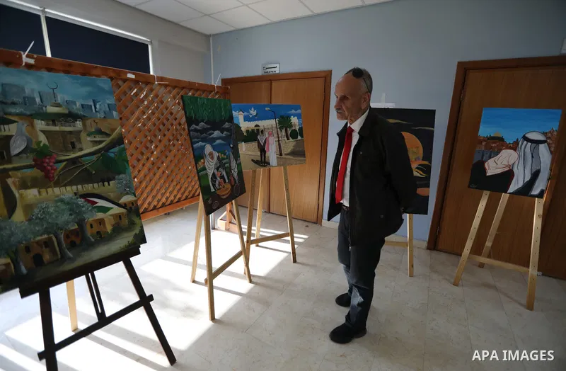Palestinians attend an exhibition "Lammat al-Khalil" in the West Bank city of Hebron on May 6, 2023. Photo by Mamoun Wazwaz
