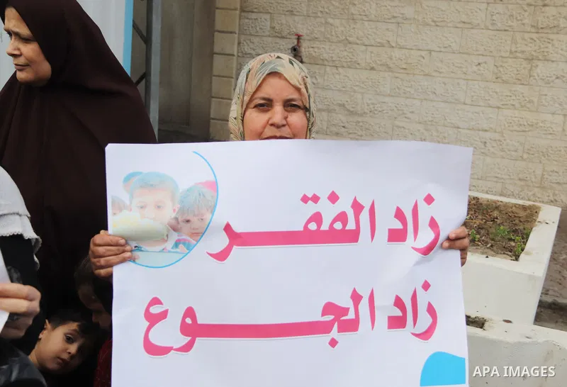 Palestinians of WFP beneficiaries take part in a protest against the stopping of aid, in front of UNSCO office in Gaza city on May 7, 2023. WFP pauses food distribution in Gaza following ‘significant diversion’ of aid. P...
