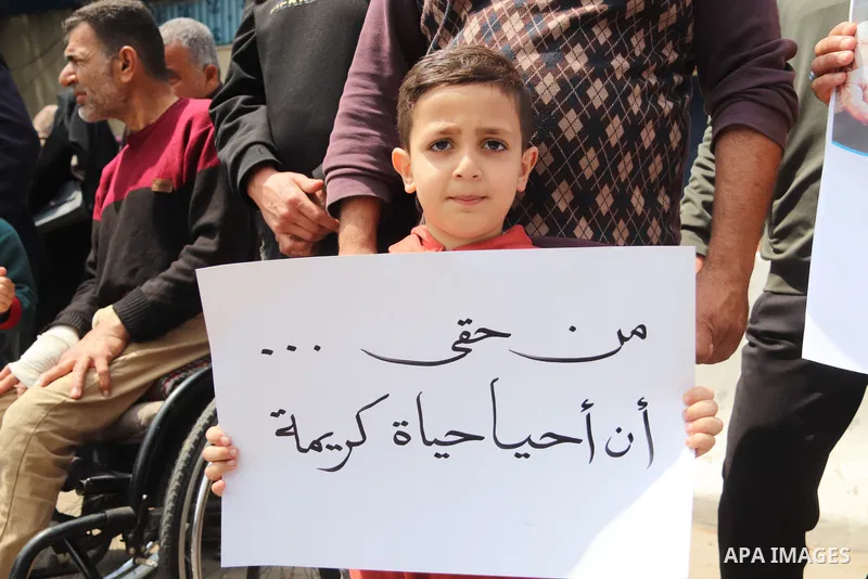Palestinians of WFP beneficiaries take part in a protest against the stopping of aid, in front of UNSCO office in Gaza city on May 7, 2023. WFP pauses food distribution in Gaza following ‘significant diversion’ of aid. P...