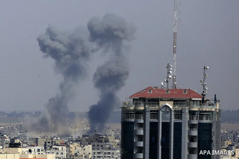 Smoke billows following Israeli military strikes in Gaza city on May 10, 2023. Israel and Gaza militants traded cross-border fire, renewing deadly violence a day after Israeli strikes killed 17 people in the Palestinian...