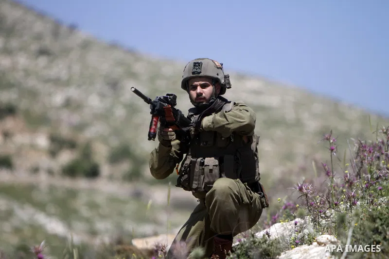 Clashes between Palestinian protesters and Israeli soldiers following a protest against the expansion of Jewish settlements, on April 14, 2023, in the West Bank village of Beit Dajan, east of Nablus. Photo by Mohammed Na...