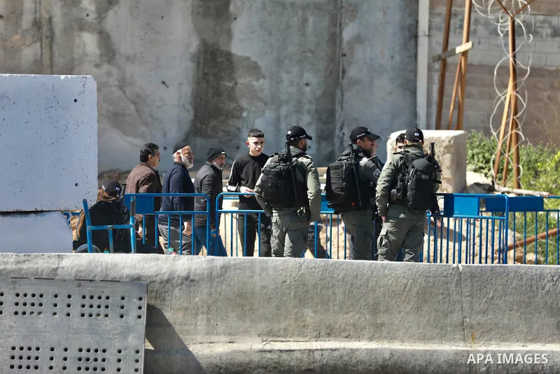 Palestinian worshippers pass the Qalandia checkpoint into Jerusalem to attend the fourth Friday prayer of the holy month of Ramadan at Al-Aqsa Mosque in Jerusalem's old city on April 14, 2023. Photo by Ahmad Arouri\ apai...