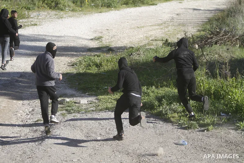 Israeli soldier clash with Palestinians following a raid by Israeli forces in the the West Bank city of Nablus on April 3, 2023. Two Palestinian youths have Monday been killed by Israeli gunfire during a military raid in...