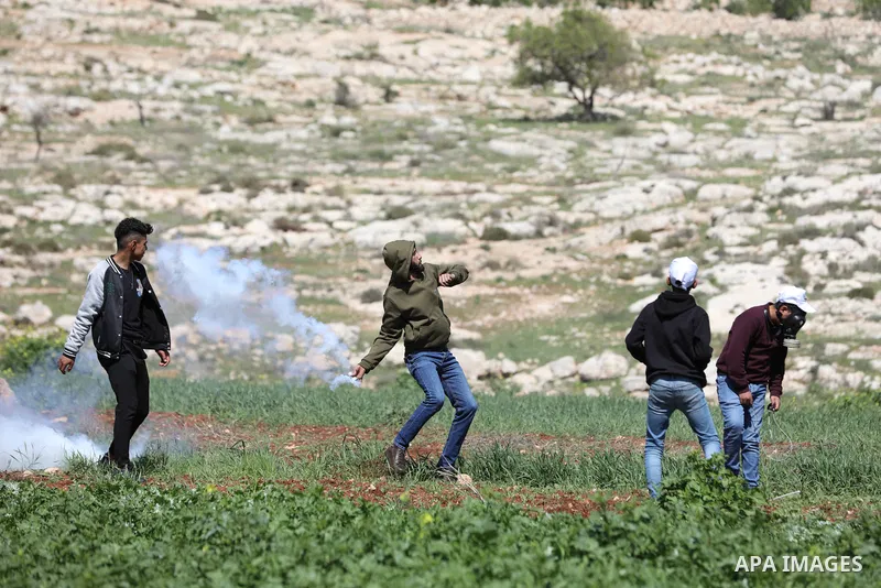 Clashes between Palestinian protesters and Israeli soldiers following a protest against the expansion of Jewish settlements, on March 17, 2023, in the West Bank village of Beit Dajan, east of Nablus. Photo by Shadi Jarar...