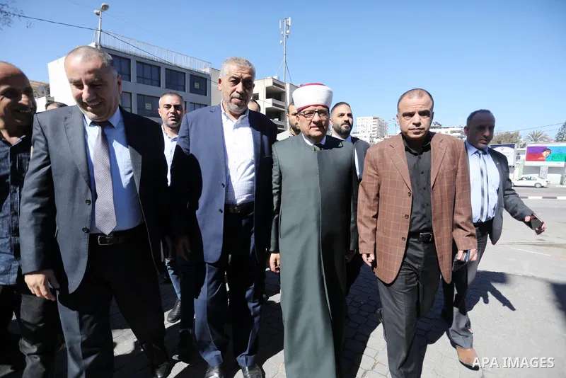 Palestinian Minister of Awqaf and Religious Affairs Hatem Al-Bakri, attends the electronic lottery to choose the names of the pilgrims in Gaza city on March 11, 2023. Photo by Omar Ashtawy\ apaimages