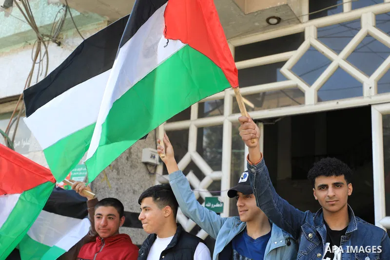 Palestinians take part in a rally in solidarity with the West Bank, in Gaza City on March 9, 2023. A special Israeli forces unit Thursday morning killed three Palestinians after opening fire at their vehicle at the entra...