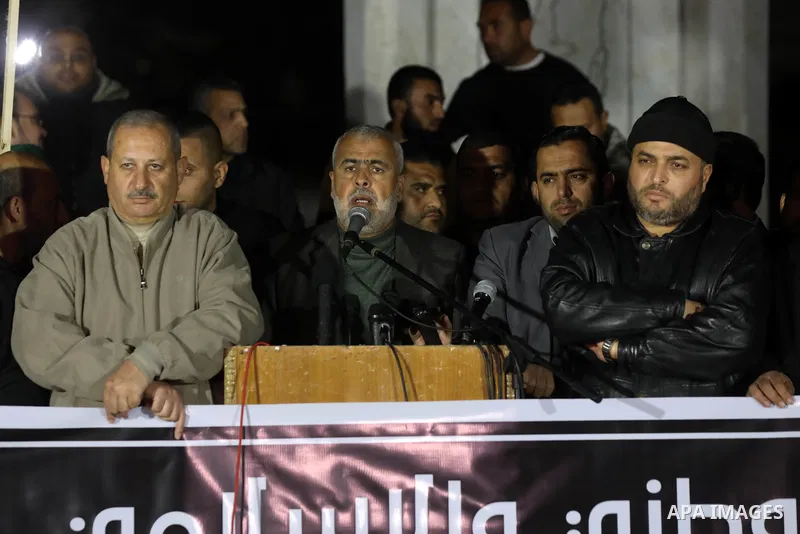 Palestinians take part in a protest following the killing of 10 Palestinians during an Israeli raid in Nablus, on Feb. 22, 2023 in Gaza City. Israeli troops killed 10 Palestinians in a raid on Nablus, while some 80 more...