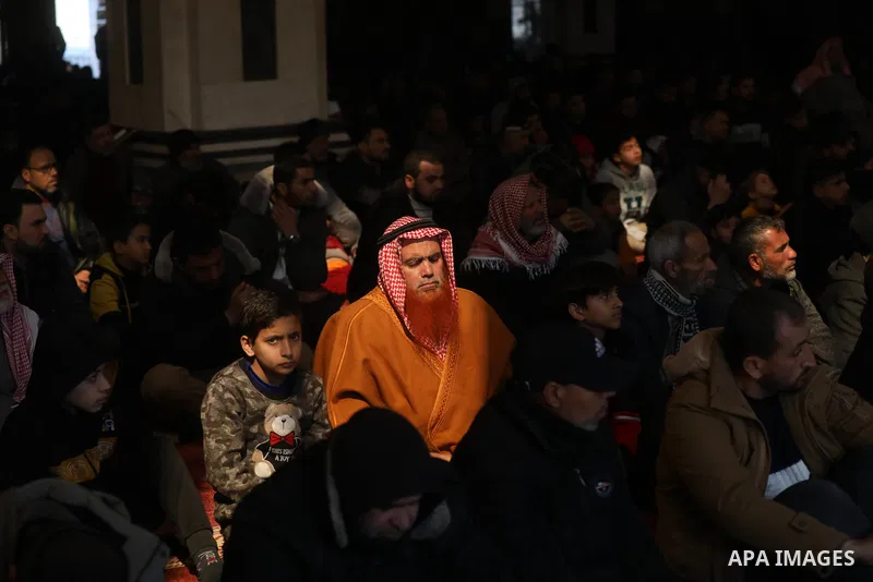 Palestinians perform absentee funeral prayers for the victims of the earthquake in Syria and Turkey at a mosque, in Khan Younis in the southern of Gaza strip on Feb. 10, 2023. More than 22000 people have died and rescuer...