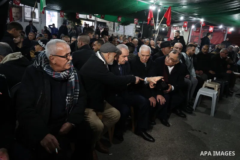 Palestinian Prime Minister Mohammad Shtayyeh condolences to the family of the 14-year-old Amr Khaled Khumour, who was killed by Isareli forces, in Dheisheh camp in the West Bank city of Bethlehem on January 18, 2023. Pho...