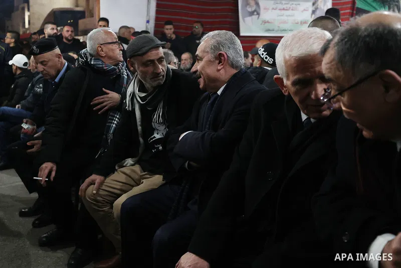 Palestinian Prime Minister Mohammad Shtayyeh condolences to the family of the 14-year-old Amr Khaled Khumour, who was killed by Isareli forces, in Dheisheh camp in the West Bank city of Bethlehem on January 18, 2023. Pho...
