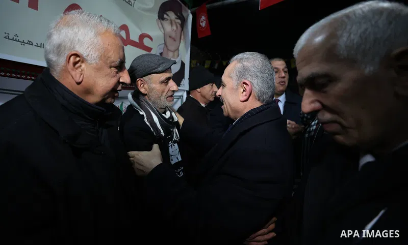 Palestinian Prime Minister Mohammad Shtayyeh condolences to the family of the 14-year-old Amr Khaled Khumour, who was killed by Isareli forces, in Dheisheh camp in the West Bank city of Bethlehem on January 18, 2023. Pho...