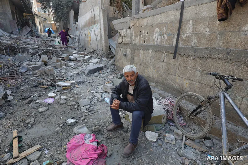 Palestinians inspect the wreckage of the destroyed buildings and the area after an Israeli attack that continues in Zawaida of Gaza on February 9, 2024. Photo by Omar Ashtawy\ apaimages