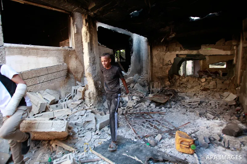Palestinians inspect a destroyed room in a house in the Tulkarem camp for Palestinian refugees, after an Israeli military raid there, in the north of the occupied West Bank on May 7, 2024. Photo by Mohammed Nasser\ apaim...