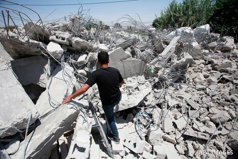 Palestinians inspect a Palestinian home demolished by Israeli army vehicles in the village of Al-Auja near Jericho, the Jordan Valley in the West Bank on July 2, 2024. Photo by Mohammed Nasser\ apaimages