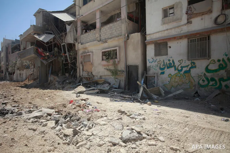 Palestinians inspect the damage after an Israeli military operation in Nur Shams camp, near the West Bank city of Tulkarem, 10July 2024. According to the Palestinian news agency Wafa, on 09 July the Israeli army (IDF) co...