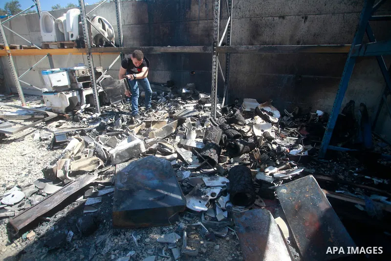 A view of damage after Jewish settlers set fire to Palestinian homes and shops in Bazarriya village in Nablus city in the northern part of the West Bank on July 12, 2024. Photo by Mohammed Nasser\ apaimages