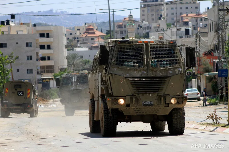 Israeli forces conduct a raid in the Tulkarem camp for Palestinian refugees in the occupied West Bank on July 23, 2024. Palestinian officials said Israeli troops killed 5 Palestinians, including two women, in a raid on a...