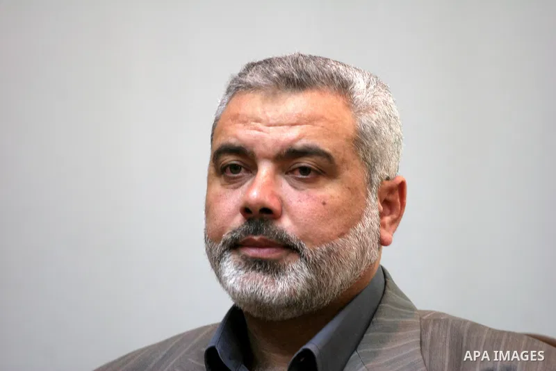 (FILES) Hamas leader Ismail Haniyeh visits the court building in Gaza. Palestinian President Mahmoud Abbas has not softened his position on reconciliation with Hamas and dialogue still depends on the Islamists ceding the...
