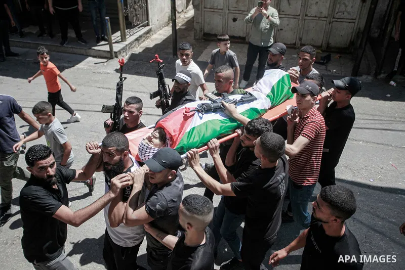 Mourners carry the body of a Palestinian killed in an Israeli airstrike, in the Balata refugee camp, in Nablus in the Israeli-occupied West Bank, August 15, 2024. Photo by Mohammed Nasser\ apaimages