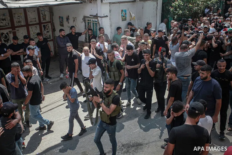 Mourners carry the body of a Palestinian killed in an Israeli airstrike, in the Balata refugee camp, in Nablus in the Israeli-occupied West Bank, August 15, 2024. Photo by Mohammed Nasser\ apaimages