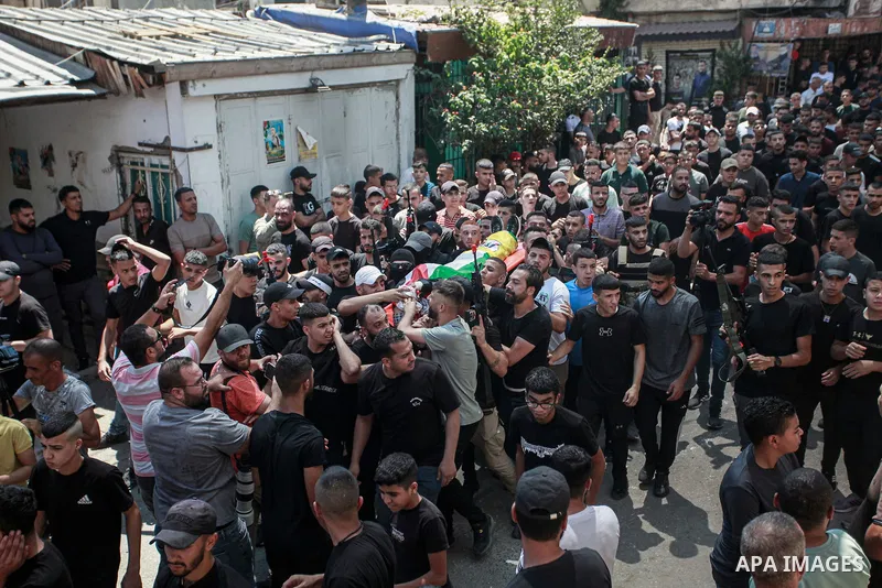 Mourners carry the body of a Palestinian killed in an Israeli airstrike, in the Balata refugee camp, in Nablus in the Israeli-occupied West Bank, August 15, 2024. Photo by Mohammed Nasser\ apaimages