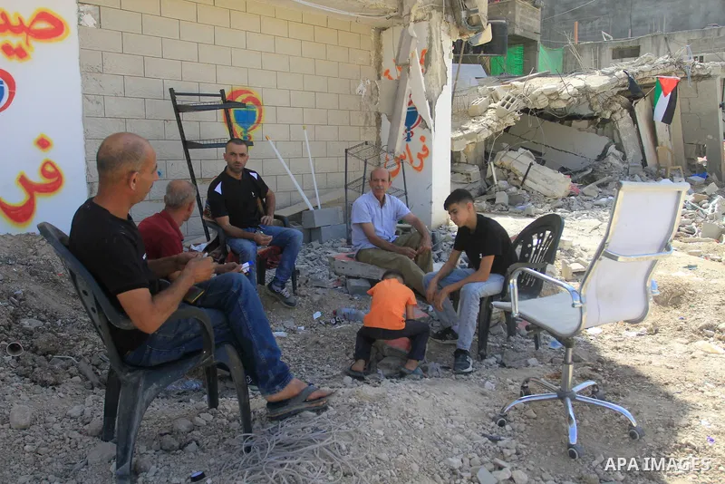 Palestinians walk amid the devastation following an Israeli army raid in Tulkarem in the north of the occupied-West Bank, on September 15, 2024. Photo by Mohammed Nasser\ apaimages