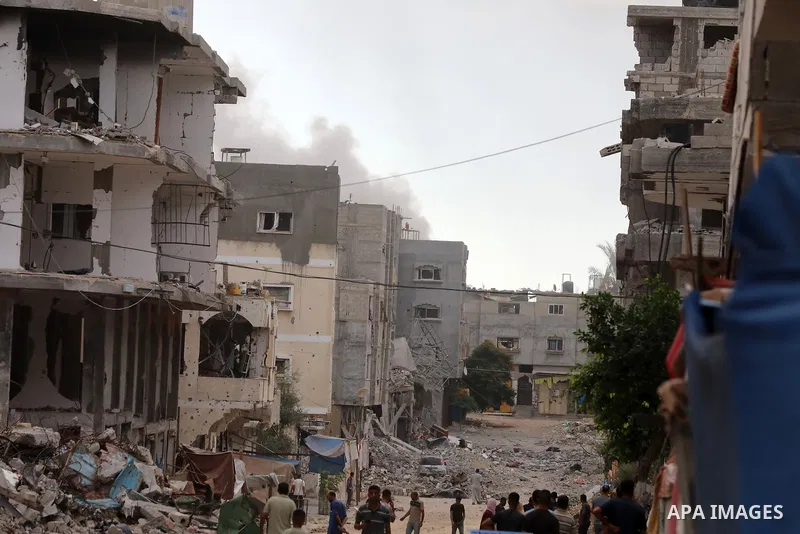 Displaced Palestinians leave an area in east Bureij Refugee camp towards the west, after the Israeli attack on a houses at Bureij Refugee camp in Gaza Strip, Gaza on September 17, 2024. At least 9 people died and 13 inju...