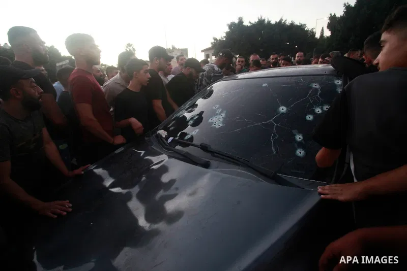 Palestinians inspect the bullet-riddled car in which four Palestinians were reportedly killed by Israeli special forces in Nablus in the occu pied West Bank on October 9, 2024. Photo by Mohammed Nasser\ apaimages