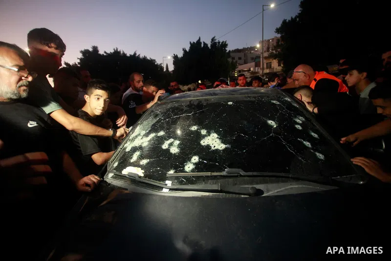 Palestinians inspect the bullet-riddled car in which four Palestinians were reportedly killed by Israeli special forces in Nablus in the occu pied West Bank on October 9, 2024. Photo by Mohammed Nasser\ apaimages