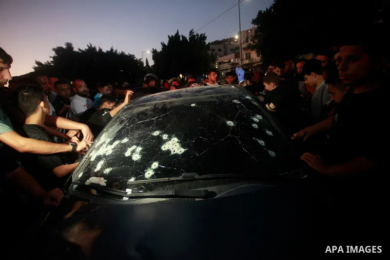Palestinians inspect the bullet-riddled car in which four Palestinians were reportedly killed by Israeli special forces in Nablus in the occu pied West Bank on October 9, 2024. Photo by Mohammed Nasser\ apaimages