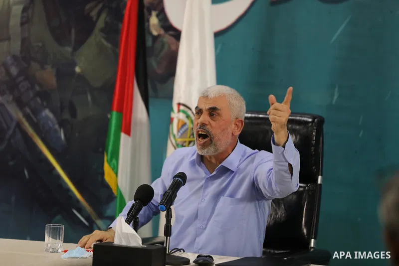FILE PHOTO: Yahya Sinwar, leader of the Palestinian Hamas movement's political speaks to media in Gaza City, on May 26, 2021. Hamas vowed today not to touch "a single cent" of international aid to rebuild Gaza following...