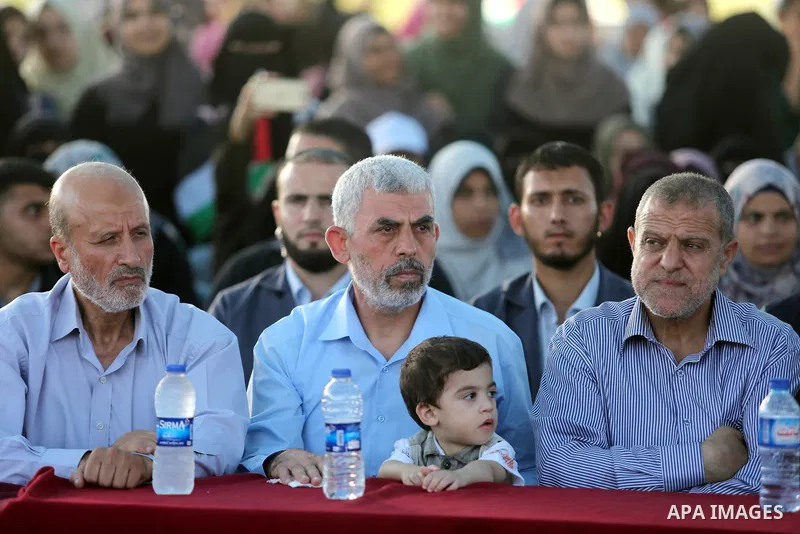 Hamas's leader in the Gaza Strip Yahya Sinwar participates during a protest by Palestinian women where Palestinians demand the right to return to their homeland along the border with Israel east of Gaza City on July 3, 2...