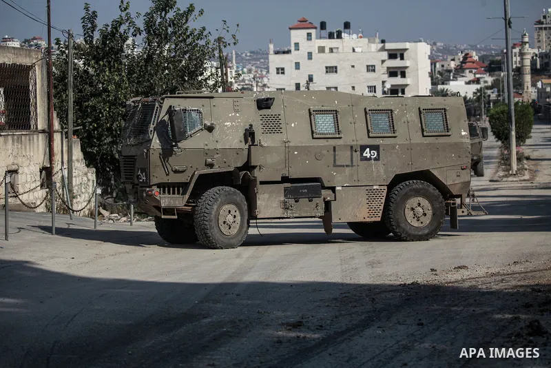Israeli soldiers reacts during a raid carried out by Israeli forces in the West Bank city of Tulkarem, 07 November 2024. According to the Palestinian Health Ministry in the West Bank, at least one Palestinian was killed...