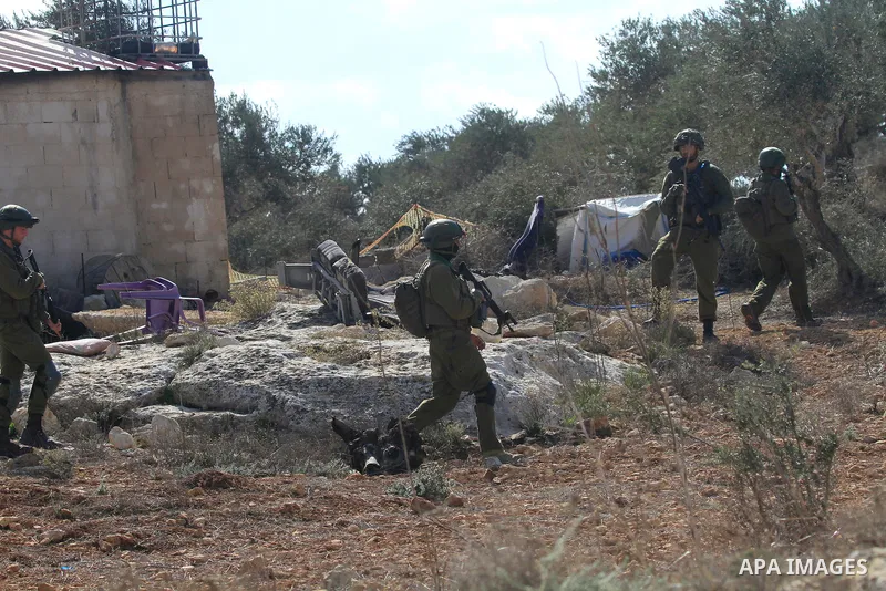 Jewish settlers attack the town of Beit Furik, east of Nablus in the West Bank. The attack included burning a vehicle and houses and clashes between Palestinians and settlers under the protection of the Israeli army,on N...
