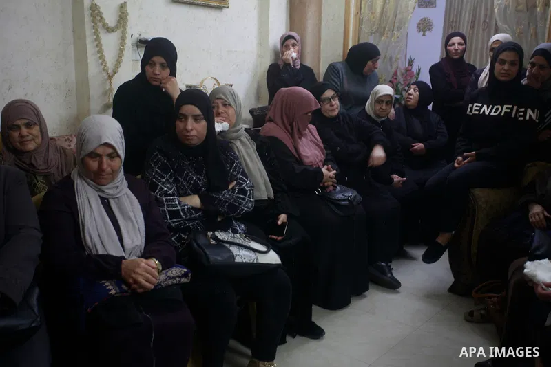 Palestinian gunmen and mourners take part in the funeral of Jihad Qatouni, who was killed in an Israeli army operation during an armed clash in the Ein Beit al-Maa refugee camp, west of Nablus in the West Bank, on Novemb...