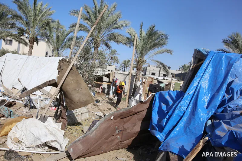 Palestinians inspect damage following an Israeli airstrike that hit a tent for displaced people, wounded six Palestinians , including children in Deir al Balah, central Gaza on November 21, 2024. Photo by Omar Ashtawy\ a...