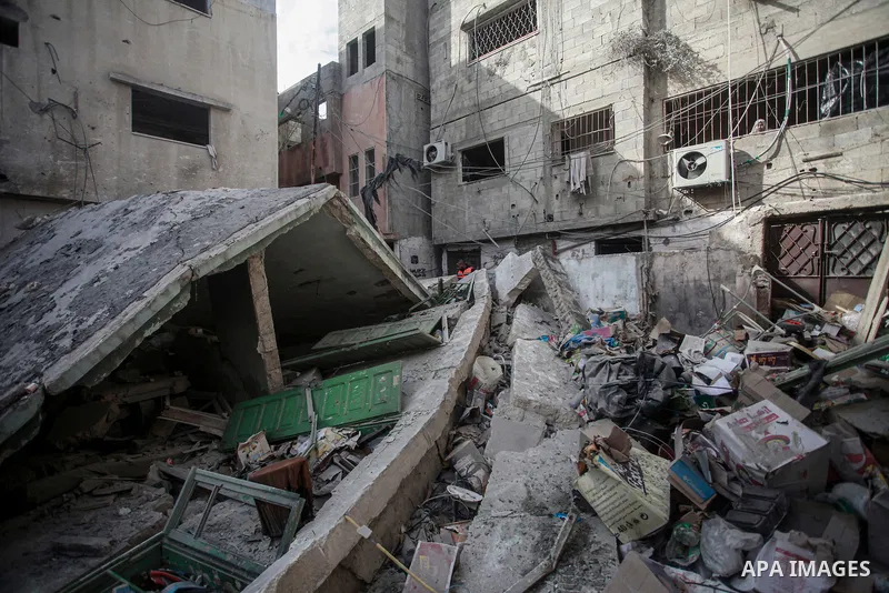 Palestinians inspect a damaged building, one day after an Israeli raid on a refugee camp near the West Bank city of Tulkarem, 25 November 2024. Photo by Mohammed Nasser\ apaimages