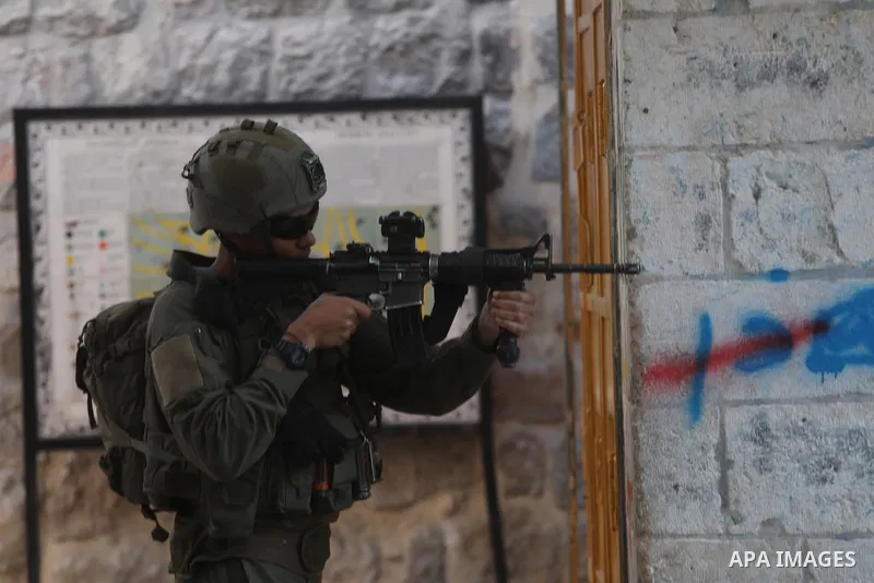 Israeli soldiers took security measures in the Old City area of Hebron, West Bank on November 30, 2024. Israeli forces raided the West Bank city of Hebron in order to provide protection for Israelis who usurped Palestini...