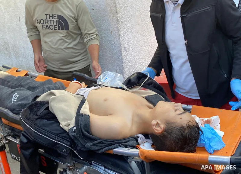 Palestinians transport injured children following an Israeli army attack on school as the others injured Palestinians are transported to Al Ahly Hospital in Gaza City, on November 30, 2024. Photo by Hadi Daoud \ apaimage...