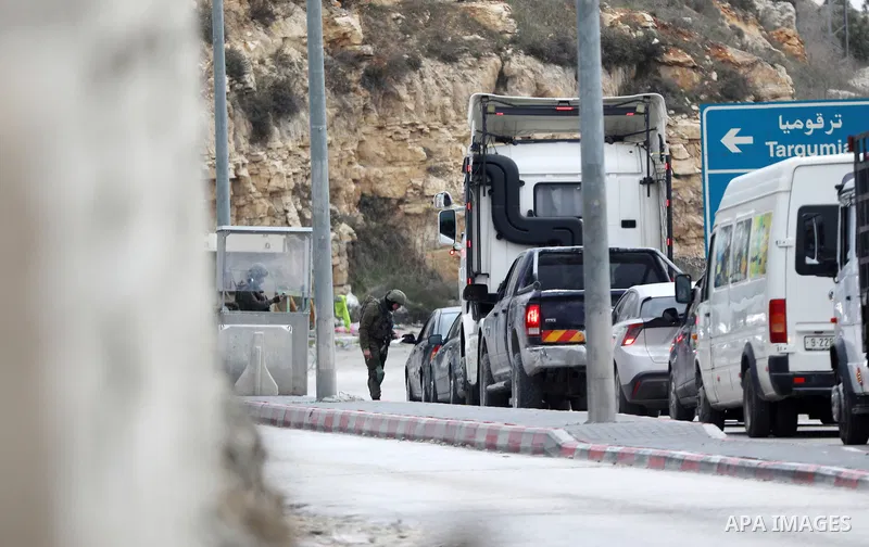 The Israeli army forces tighten their military measures at the entrances and exits of the governorates in the city of Hebron in the West Bank, on 22 January 2024. Photo by Mamoun Wazwaz\ apaimages