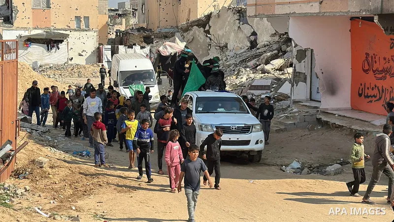 People perform Friday prayers and funeral prayers in absentia for the members of the Al-Qassam Brigades (the armed wing of the Palestinian group Hamas) in Khan Yunis, Gaza on January 31, 2025. Photo by Doaa el-Baz\ apaim...